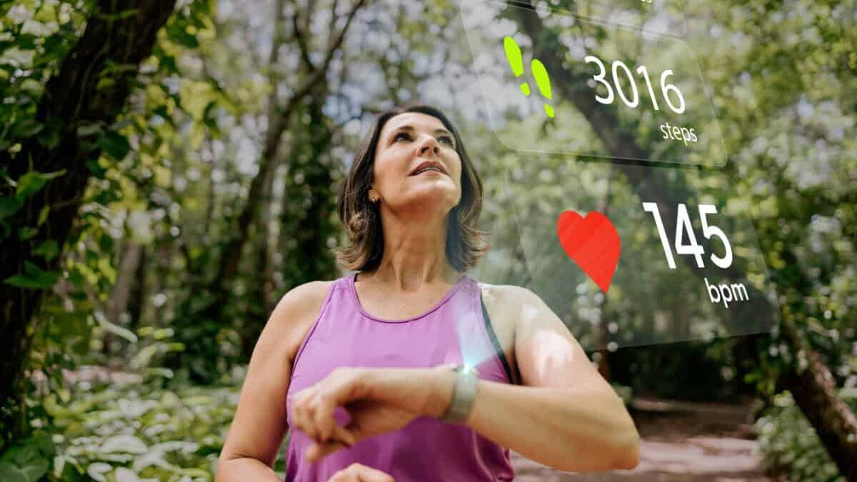runner checks her biodata on smartwatch
